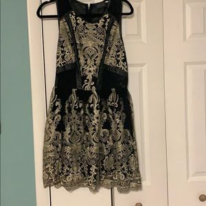 Dress with gold embroidery